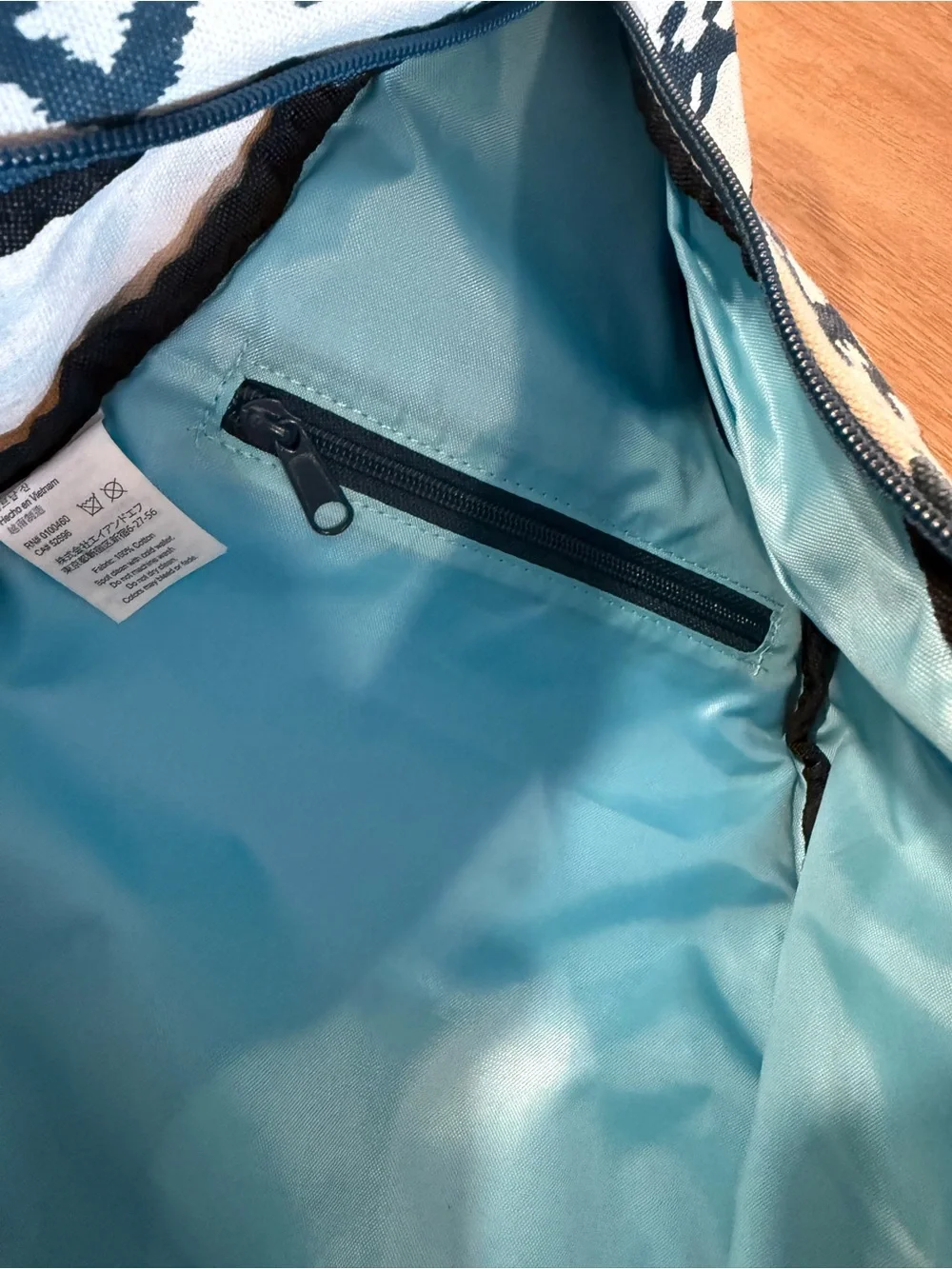 Kavu Cream & Navy Patterned Sling Pack